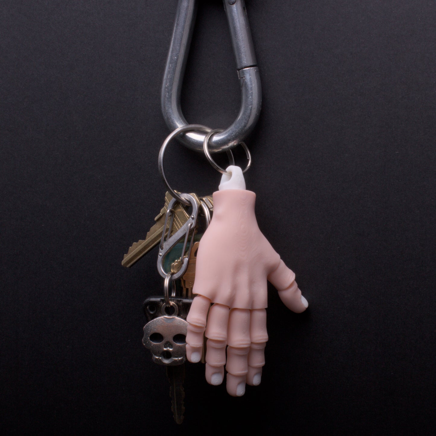 Severed hand keychains