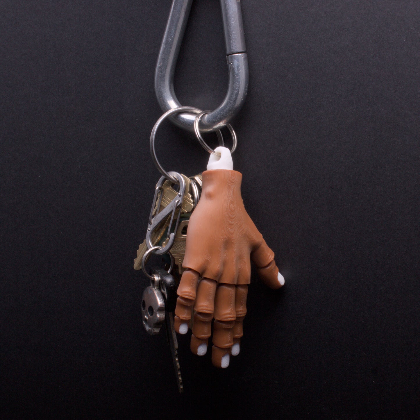 Severed hand keychains