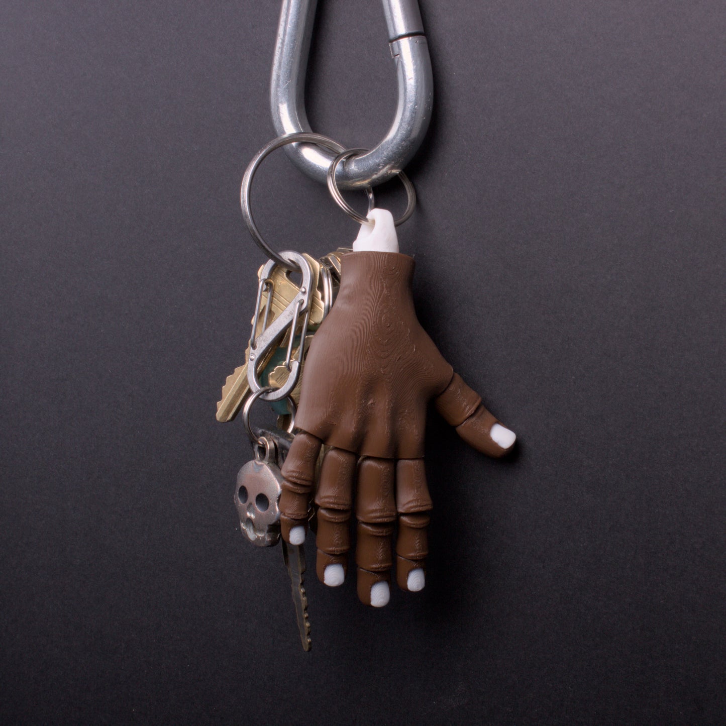 Severed hand keychains