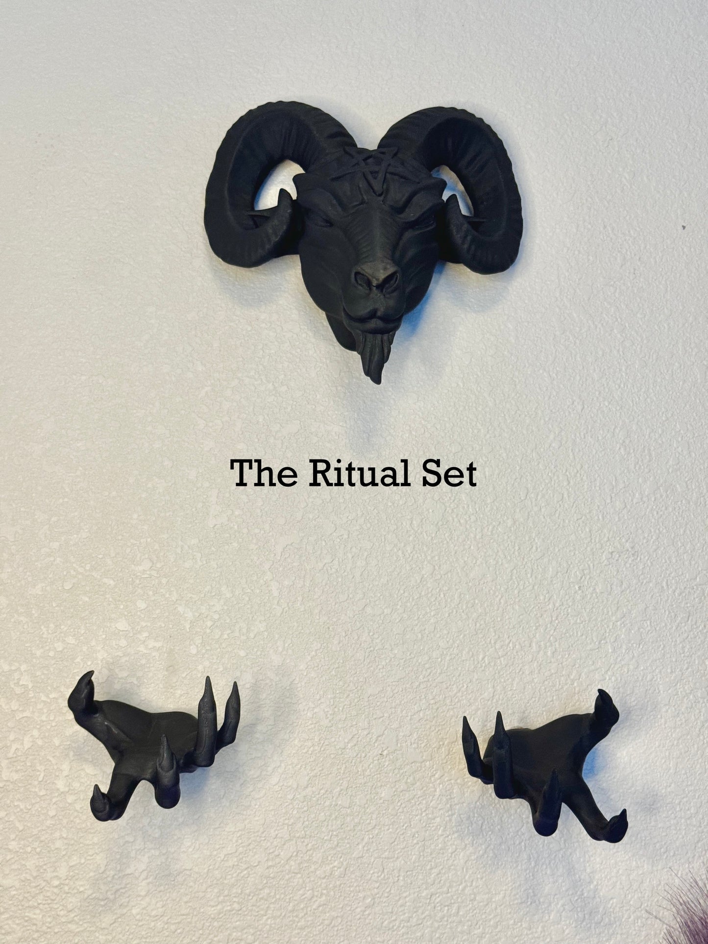 Wall-mounted Baphy head and hands