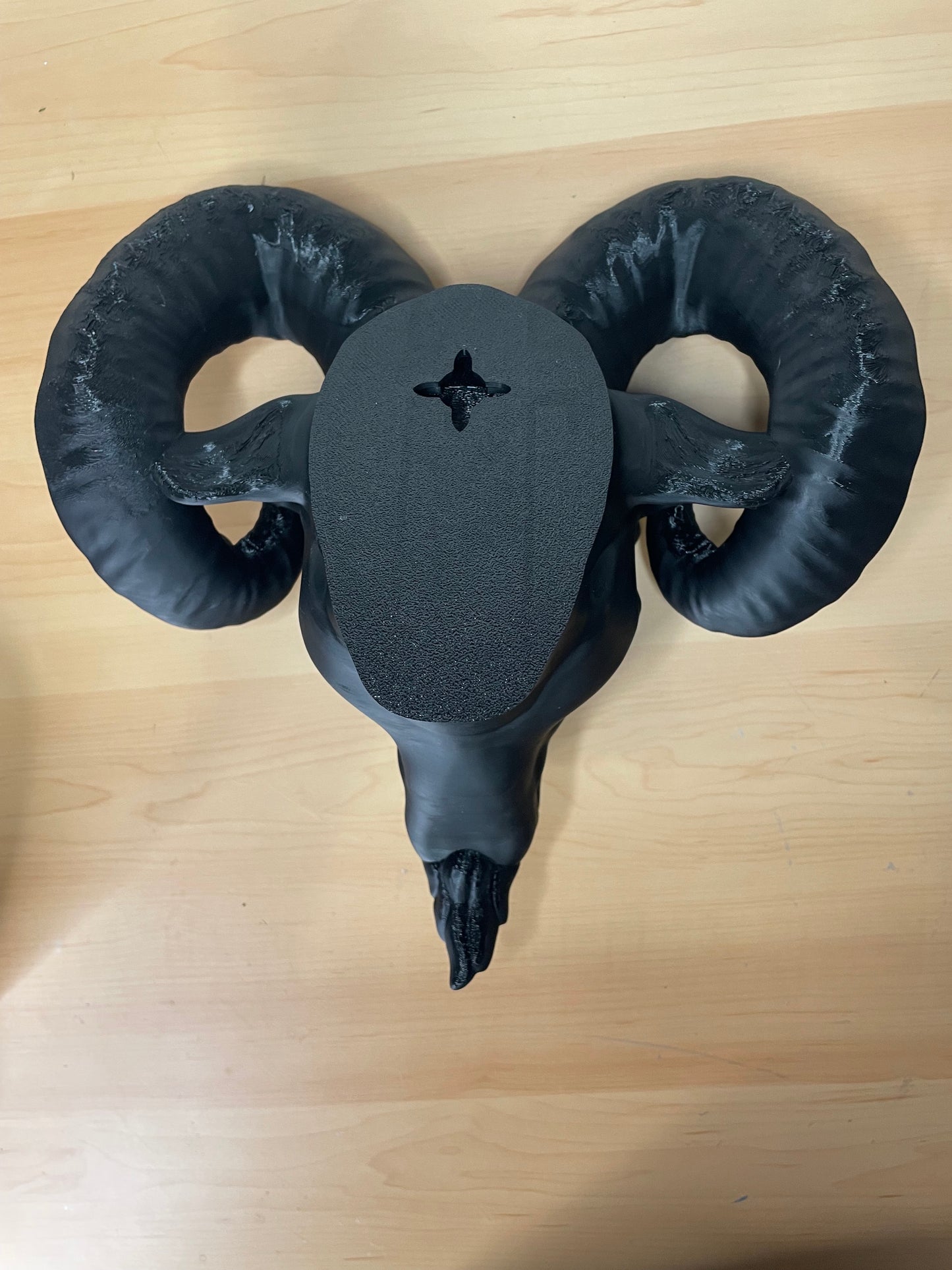 Wall-mounted Baphy head and hands