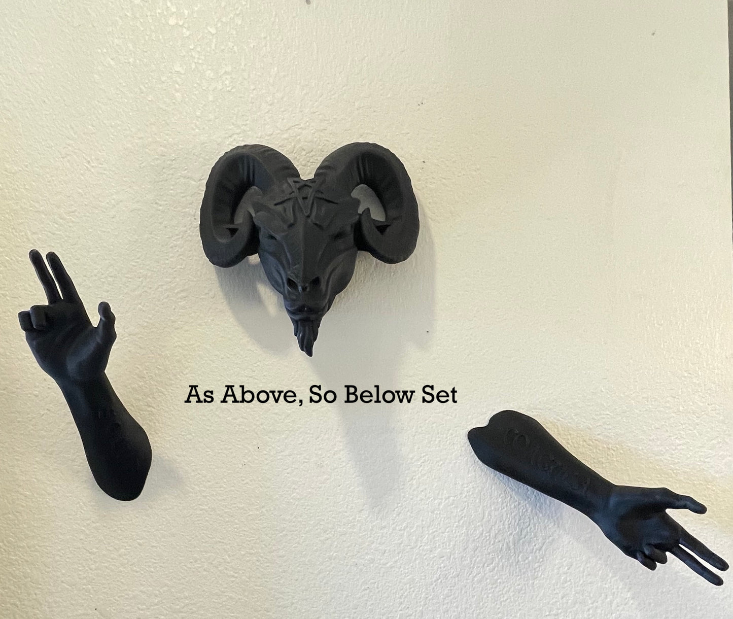 Wall-mounted Baphy head and hands